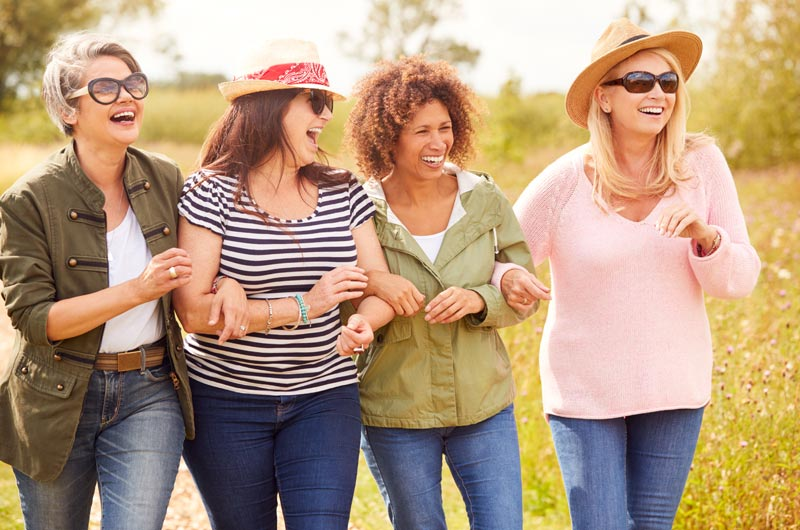 photo of a group of women walking outdoors