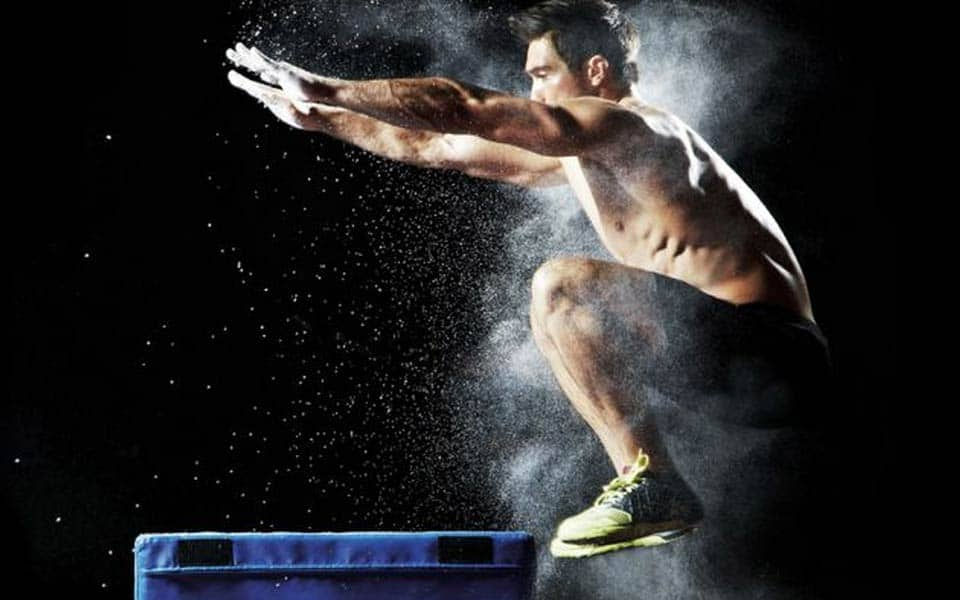 Athletic man in a dynamic action pose