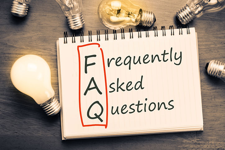 Notepad graphic reading 'Frequently Asked Questions' surrounded by pencils and a lightbulb