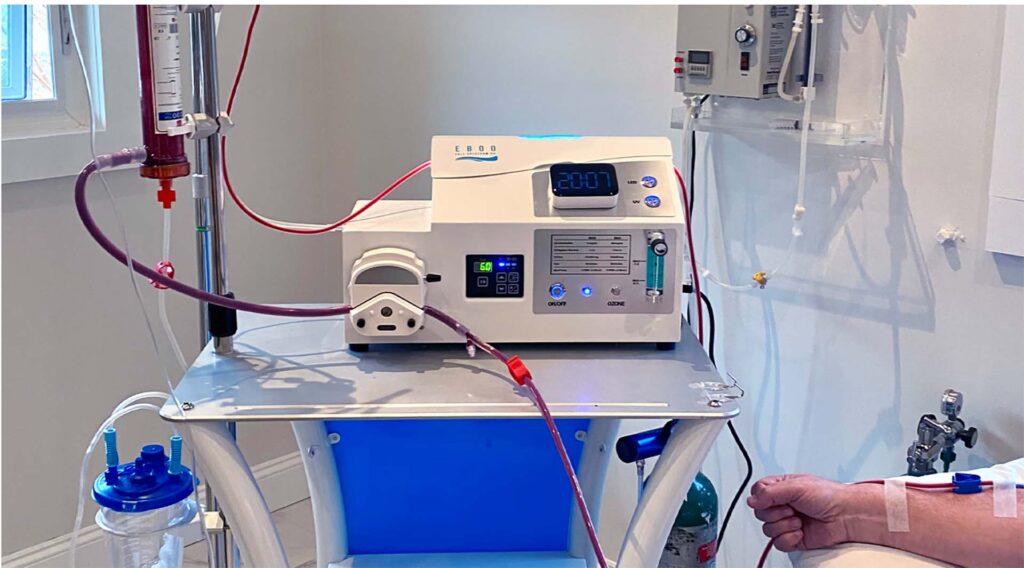 EBOO therapy machine and equipment in a treatment room