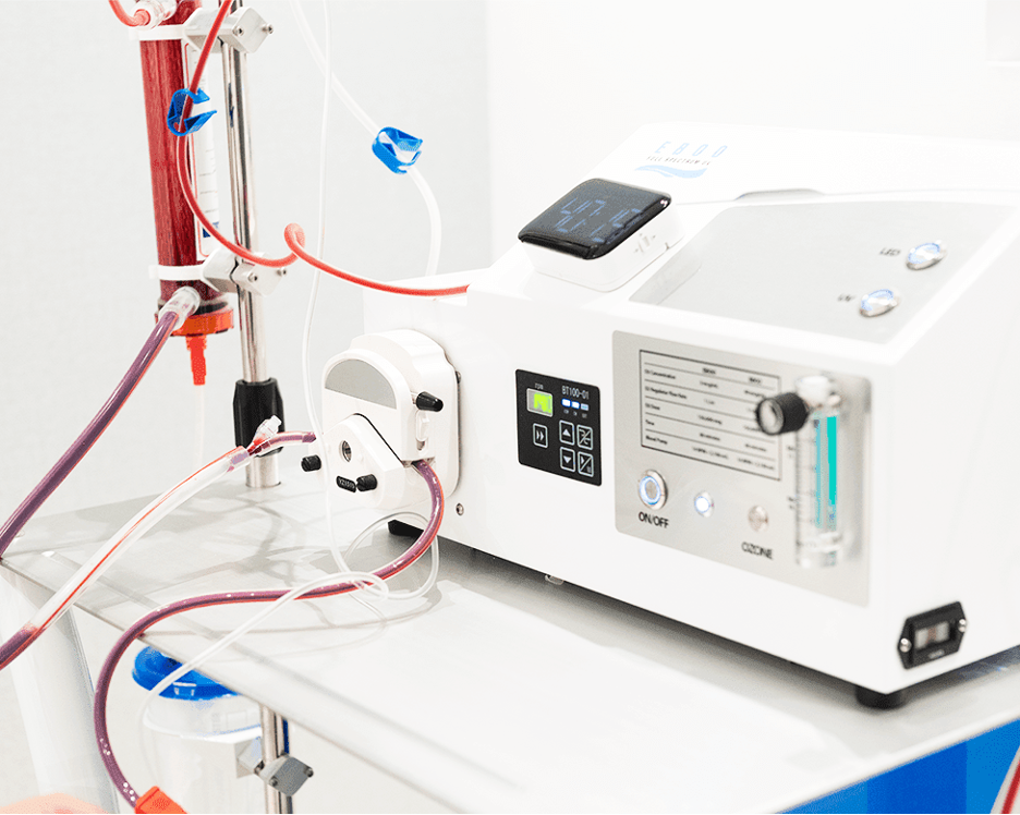 Close-up of EBOO therapy machine with connected tubing